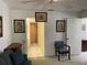 Comfortable living room with neutral carpet, stylish decor and furnishings, exuding warmth and charm at 4944 Village Gardens Dr # 151, Sarasota, FL 34234