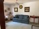 Comfortable living room with neutral carpet, stylish decor and furnishings, exuding warmth and charm at 4944 Village Gardens Dr # 151, Sarasota, FL 34234