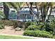 Charming community gazebo offering a shaded seating area, surrounded by lush landscaping at 5055 Gulf Of Mexico Dr # 422, Longboat Key, FL 34228