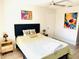 Charming bedroom with a cozy bed, soft lighting, and stylish décor at 5061 Barrington Cir # 1302, Sarasota, FL 34234