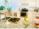 Bright kitchen featuring granite countertops and stainless steel appliances at 5061 Barrington Cir # 1302, Sarasota, FL 34234