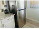 Kitchen featuring modern, stainless steel refrigerator with granite counter tops at 5061 Barrington Cir # 1302, Sarasota, FL 34234