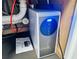 Tankless water filtration system installed under kitchen sink at 5061 Barrington Cir # 1302, Sarasota, FL 34234