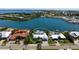 Aerial view of waterfront property highlighting the home's location on the bay at 527 Key Royale Dr, Holmes Beach, FL 34217