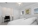 This bedroom features a desk area, closet, and neutral color palette at 527 Key Royale Dr, Holmes Beach, FL 34217