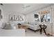 Comfortable living room with white walls, modern decor, and natural light at 527 Key Royale Dr, Holmes Beach, FL 34217