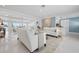 Elegant living room featuring neutral tones, modern furniture, and an open floor plan at 527 Key Royale Dr, Holmes Beach, FL 34217