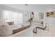 Bright living room featuring stylish furniture, modern decor, and natural light at 527 Key Royale Dr, Holmes Beach, FL 34217