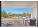 Outdoor balcony with seating and ocean views, perfect for relaxing and enjoying the coastal scenery at 5300 Ocean Blvd # 202, Sarasota, FL 34242