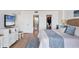 Comfortable bedroom with a view into the bathroom and large closet at 5300 Ocean Blvd # 202, Sarasota, FL 34242