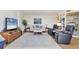 Spacious living room featuring modern decor and natural light throughout at 5300 Ocean Blvd # 202, Sarasota, FL 34242