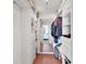 Walk-in closet with custom shelving and drawers to maximize storage space and help organize your belongings at 5300 Ocean Blvd # 202, Sarasota, FL 34242