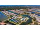 Stunning aerial view of a Primary-planned community featuring beautiful homes, serene lakes, and lush landscaping at 5329 Trails Bend Ct, Sarasota, FL 34238