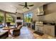 A fully equipped outdoor kitchen with a grill and screened lanai perfect for entertaining and relaxing at 5329 Trails Bend Ct, Sarasota, FL 34238