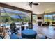 Spacious lanai with comfortable seating and a view of the screened pool at 5329 Trails Bend Ct, Sarasota, FL 34238