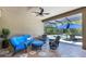 Inviting covered patio with stylish furniture, screened-in pool views, and a relaxing atmosphere at 5329 Trails Bend Ct, Sarasota, FL 34238