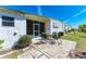 Back patio with outdoor table and chairs, ideal for entertaining and relaxation at 5619 Bayshore Rd # 423, Palmetto, FL 34221