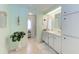 Bathroom featuring vanity with white cabinets and doorway to the shower room at 5619 Bayshore Rd # 423, Palmetto, FL 34221