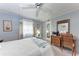 Bright bedroom with a desk and chair next to a dresser, offering a comfortable workspace at 5619 Bayshore Rd # 423, Palmetto, FL 34221