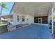 Spacious carport with a screened entry, providing ample parking and outdoor living space at 5619 Bayshore Rd # 423, Palmetto, FL 34221