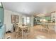 Open-concept dining area flows into the kitchen and features a sliding glass door at 5619 Bayshore Rd # 423, Palmetto, FL 34221