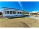 Charming single-story home with a carport and awnings over the windows at 5619 Bayshore Rd # 423, Palmetto, FL 34221