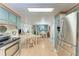 Open floor plan showcases the kitchen with stainless appliances and an eat-in area at 5619 Bayshore Rd # 423, Palmetto, FL 34221