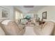 Expansive living room with plush seating, a large TV, and plenty of natural light at 5619 Bayshore Rd # 423, Palmetto, FL 34221