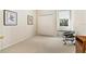 Cozy bedroom with a window seat, carpeted floors, and natural light at 6602 Peach Tree Creek Rd, Bradenton, FL 34203