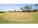 Scenic golf course with manicured greens and beautiful landscaping at 6602 Peach Tree Creek Rd, Bradenton, FL 34203
