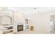 Bright living area featuring fireplace and built-in shelves at 6602 Peach Tree Creek Rd, Bradenton, FL 34203