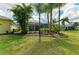This house features a screened in lanai, lush landscaping, and a private backyard at 7278 Lismore Ct, Lakewood Ranch, FL 34202
