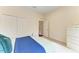 Bedroom with double closets featuring a decorative comforter and bright natural light at 7278 Lismore Ct, Lakewood Ranch, FL 34202
