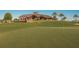 Scenic golf course with the clubhouse in the background and lush green fairways at 7278 Lismore Ct, Lakewood Ranch, FL 34202