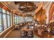 Elegant restaurant with large windows offering picturesque views and comfortable seating at 7278 Lismore Ct, Lakewood Ranch, FL 34202
