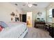 Bright bedroom offering an aquarium and custom decor with an attached bathroom at 750 116Th Ne Ct, Bradenton, FL 34212