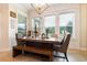 Bright dining area with large windows and stylish decor at 750 116Th Ne Ct, Bradenton, FL 34212