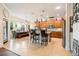 Gourmet kitchen with granite countertops, stainless steel appliances, and center island at 750 116Th Ne Ct, Bradenton, FL 34212