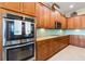 Modern kitchen with stainless steel appliances and ample cabinet space at 750 116Th Ne Ct, Bradenton, FL 34212