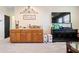 Second floor living room with wet bar and comfortable furnishings at 750 116Th Ne Ct, Bradenton, FL 34212