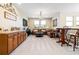 Second floor living room with wet bar, pendant lighting, and comfortable furnishings at 750 116Th Ne Ct, Bradenton, FL 34212
