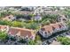 Overhead view of condo community highlighting the well-maintained grounds, pool, and nearby amenities at 850 S Tamiami Trl # 730, Sarasota, FL 34236