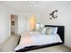 This bedroom has neutral decor and an ensuite bathroom and access to a full bathroom, offering convenience at 850 S Tamiami Trl # 730, Sarasota, FL 34236