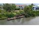 Waterfront condominium complex with private dock and access to calm waters at 850 S Tamiami Trl # 730, Sarasota, FL 34236