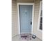 Welcoming front door with a charming welcome mat and stylish exterior details at 850 S Tamiami Trl # 730, Sarasota, FL 34236