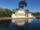 Beautiful reflection of the Heritage Harbour community entrance sign in the pond at 9121 Stone Harbour Loop, Bradenton, FL 34212