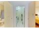 Hallway shot featuring a bathroom, laundry room, and bedroom at 9121 Stone Harbour Loop, Bradenton, FL 34212