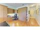 Home office with custom cabinetry, built-in shelving, a Murphy bed, and ample workspace at 9121 Stone Harbour Loop, Bradenton, FL 34212