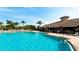Beautiful community pool with clear blue water and a spacious deck area for relaxation at 9121 Stone Harbour Loop, Bradenton, FL 34212