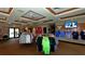 Well-stocked pro shop featuring apparel and accessories for golf and leisure, including a TV for entertainment at 9121 Stone Harbour Loop, Bradenton, FL 34212